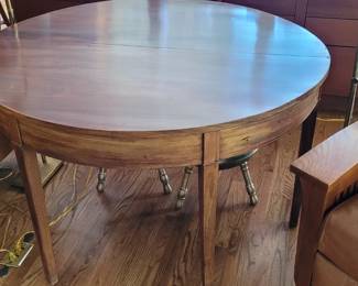 Mahogany gateleg table, fully opened, from the home of the former owners of Casey's Department Store at Duke of Gloucester Street