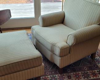 One of a pair of upholstered chairs with matching ottoman