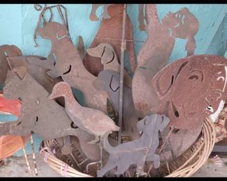 Numerous Rusty Yard Spikes; There is ALOT of Yard Art 