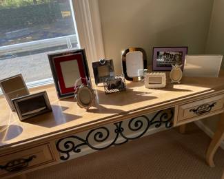 Thomasville console/desk with 2 drawers; shown with picture frames 