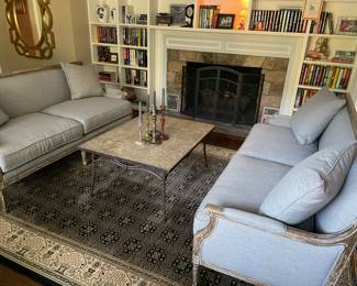 Pair of matched couches (w down inserts), 100% wool large area rug (11' x 8'), cocktail table - metal base, and large gold art deco mirror, books and more!