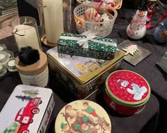 Holiday tins, candles, and ornaments