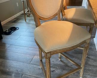 Another view of the counter-height stools with ivory upholstery and distressed oak finish - set of 3 available