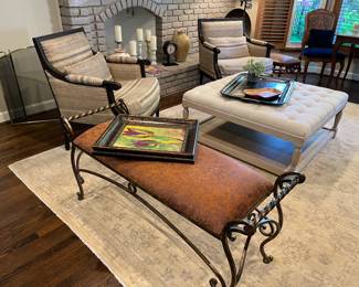 Ralph Lauren armchairs (matched set of 2), 42" ottoman with lower tier, leather and metal bench, large metal tray, pottery, candle holders with flameless candles, and original artwork