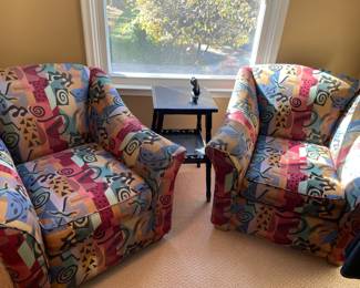 A matched set of Art-deco style armchairs with slopped arms and that are very comfortable :) shown with black 2 tier side table 