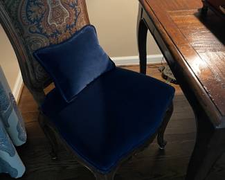 Another view of the game table side chairs with blue velvet seats