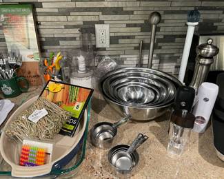 Kitchen essentials:  Le Creuset oval pan, pyrex pan, stainless bowls, measuring cups, salt and pepper mills, paper towel holders, and more festive finds!