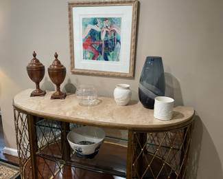 demi-lune console with glass shelves (lit), Barbara Woods artwork, Wedgewood "The Boat Race Bowl" (104/200)  and 2 ivory canisters, Waterford Evolution (blue) vase, and matched set of art deco wood urns