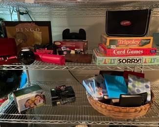 Games: including bingo, card, shufflers, and board games; Notebooks and