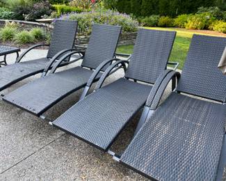Brown wicker chaise loungers (4 available)