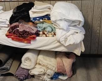 Blankets, bath rugs, and more