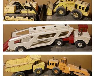 1:  Tonka Yellow front end loader metal frame (1970’s)
2. T-9 Mighty Tonka Dozer (1970’s)
3.  Mighty Tonka Car Carrier Red White Double Truck Vintage 1970 - Pressed Steel
4.  Mighty Tonka Yellow Pressed Steel Dump Truck XMB-975 Tires 1970's
5. 1970's 24" Mighty Tonka Pressed Steel Road Grader USA Construction Truck