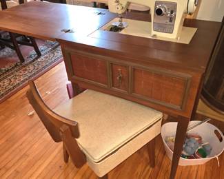 Sears Kenmore sewing machine (never used) and cabinet. 