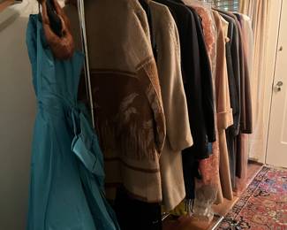 Women's dresses, vintage tops and bottoms, wedding gown, formal gown, and furs.