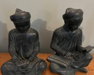 After Georges Denys Dutheil's original sculptures, "Jeune Homme Vietnamien Lisant" and "Vietnamien". 1958 bronzed chalkware.