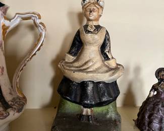 antique Judd MFG cast iron doorstop, milk maid in apron
