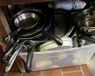 Modern cookware. Pots, pans, pyrex, silverware