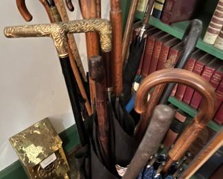 Antique and vintage canes and brass umbrella stand