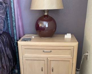 Light oak Thomasville night stand, with purple lamp