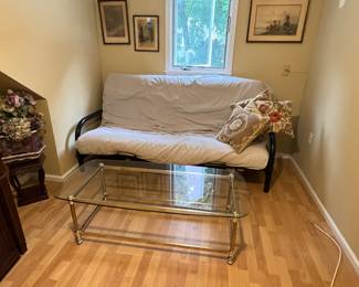 GLASS TOP AND BRASS COFFEE TABLE AND FUTON