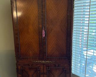 Vintage Parcel Gilt Mahogany Cabinet. Measures 38" W x 70" H x 18" D. Photo 1 of 3.