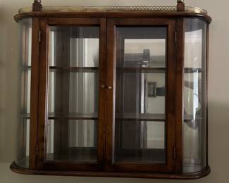 Wall-Mounted Curio Cabinet with Mirrored Back and Brass Gallery Trim. Photo 1 of 2.