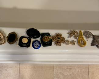 Broaches.