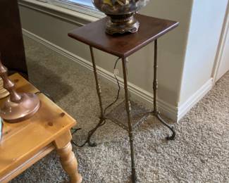 Excellent Vintage wood top and ornate metal base plant or lamp stand.