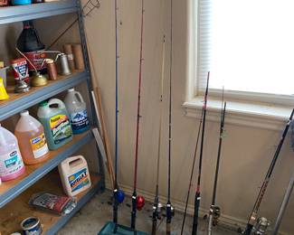 Group of fishing poles and gear.