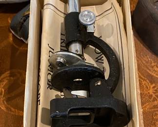 Miniature microscope in original box.