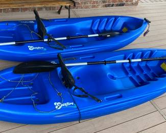 8' pair of Quality Spitfire Blue Kayak's with paddles. Clean and ready to put in the water.