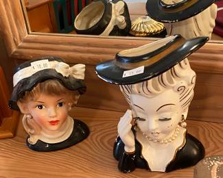 couple of headvases with repairs or damage.