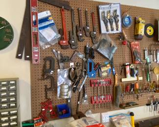 Wall full of tools, many USA vintage