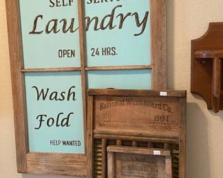 Laundry room pieces along with some vintage washboards.