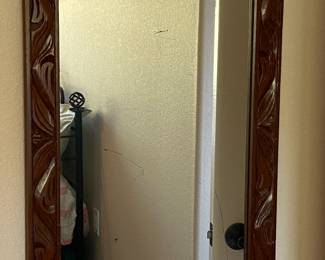 Hand crafted carved wood framed Wall Mirror.