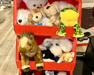 Many plus animals, several brands, plastic bins