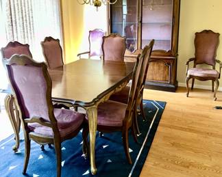 Second view of Thomasville dining table with 8 chairs including 2 captains chairs, matching China cabinet