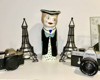 Vintage Nikon and Canon cameras Eiffel Tower candle holders, ceramic lady decor