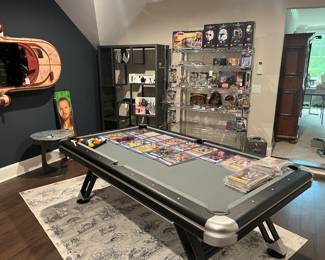 Pre sell item priced at 600. MD Sports pool table with balls and cues. Nice table that can easily be moved. 7'4" table.