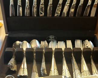 Pre sell item priced at 2200. Lunt sterling 76 piece silverware set in excellent condition with case. Total grams is 2617.