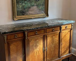 Pre sell item priced at 2500. French Louis XVI Style Mahogany buffet. Inlaid satinwood, marquetry decorations, eight legs, bronze ormolu mounts, green marble top. Circa 1935. 41 x 22 x 67. Beautiful piece. It was appraised in Massachusetts by "The Appraisers Registry" for 6000.