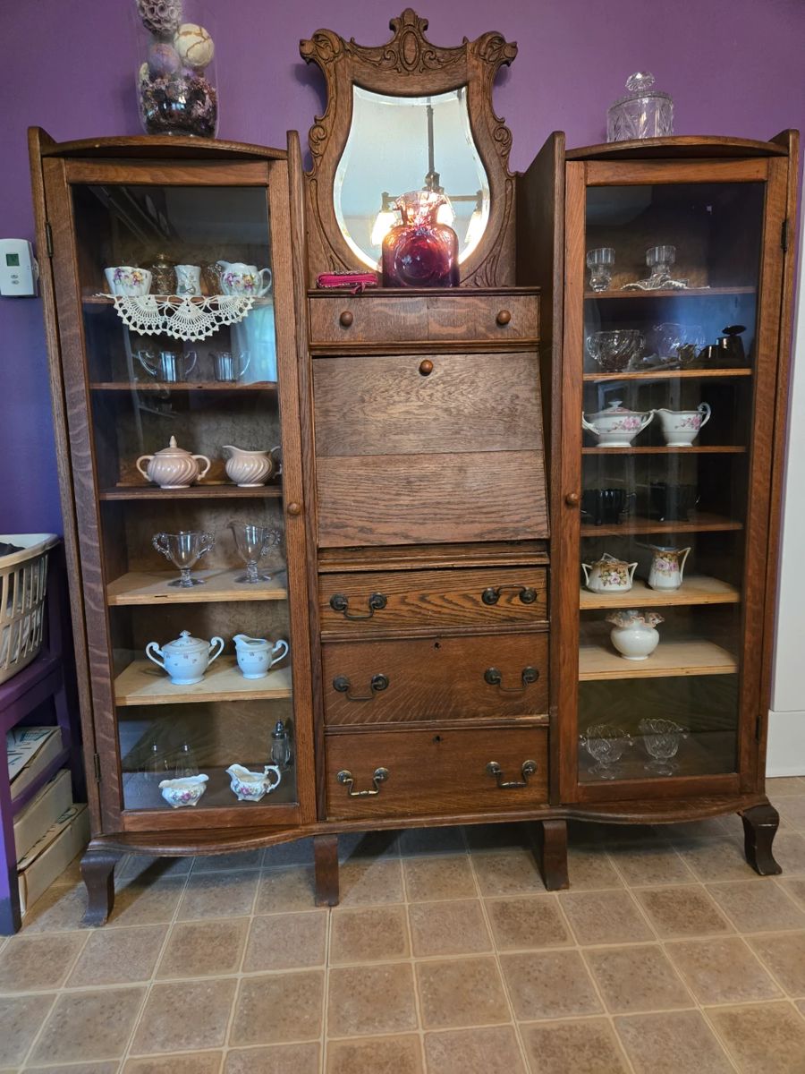Unusual double oak mirrored bookcase - Purchased in the 1970s from The Emporium in Kalamazoo.