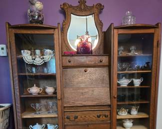 Unusual double oak mirrored bookcase - Purchased in the 1970s from The Emporium in Kalamazoo.