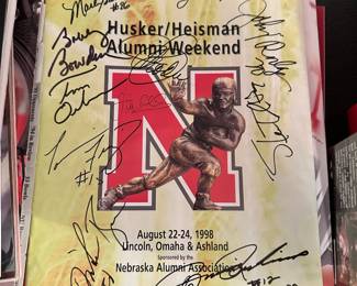 Autographed Husker / Heisman Program (JOHNNY RODGERS, MIKE ROZIER, TOM OSBORNE, TOMMY FRAZIER, STEVE TAYLOR)