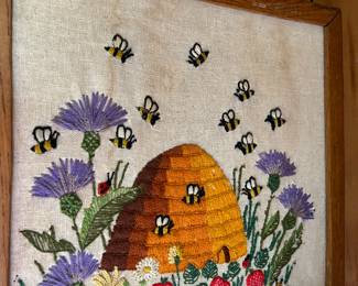 Vintage crewel stitched artwork