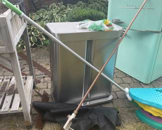 Mini Fridge & Simple Human Garbage Can. 