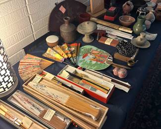 Hand-painted fans, pottery pieces, and other misc. items.