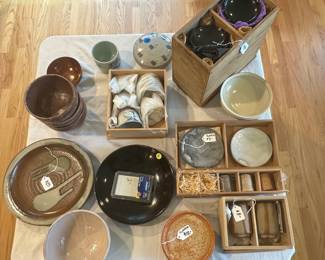 Pottery sets and individual pieces.
