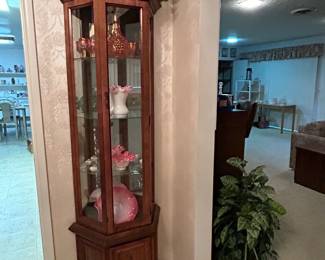 One of several curio cabinets.