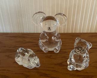 Crystal and glass animal figurines.